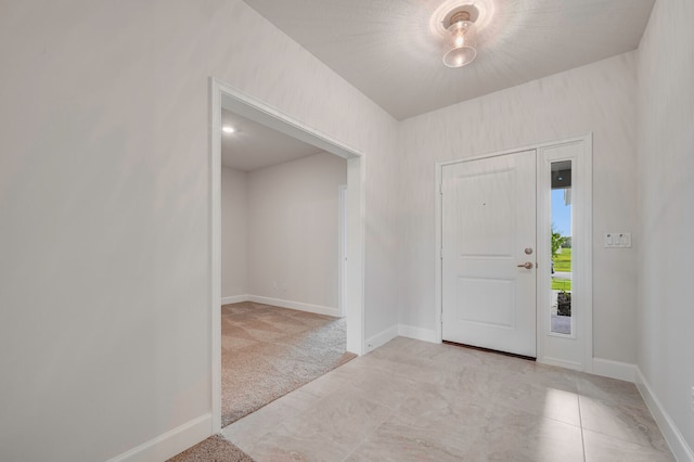 view of carpeted entryway