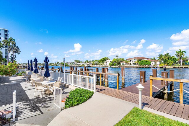 dock area featuring a water view