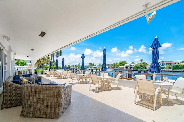 view of patio featuring a water view