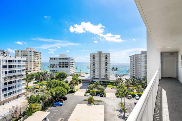 balcony featuring a water view