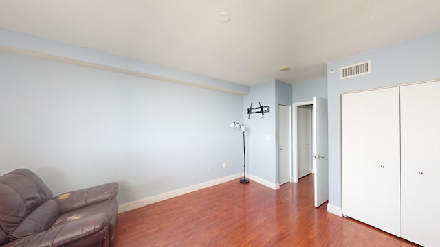 interior space with hardwood / wood-style flooring