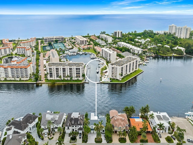 aerial view featuring a view of city and a water view