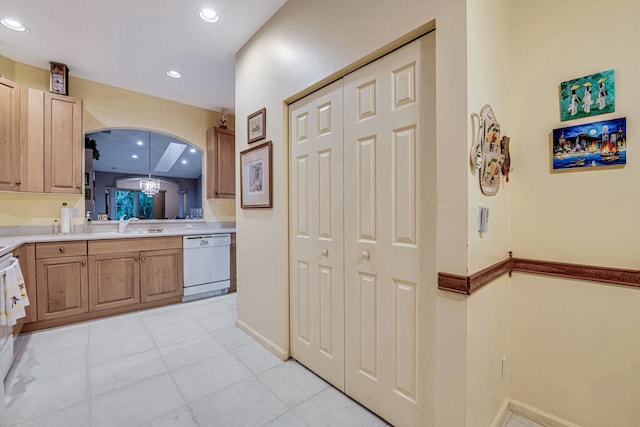 kitchen featuring dishwasher and sink