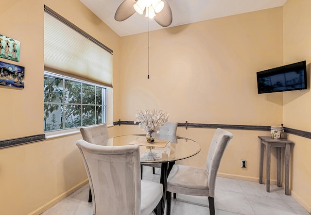 dining area with ceiling fan