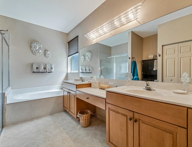 bathroom featuring vanity, tile patterned floors, and shower with separate bathtub