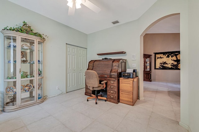 tiled office featuring lofted ceiling and ceiling fan