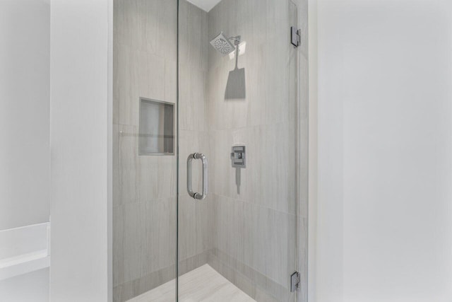 bathroom with an enclosed shower