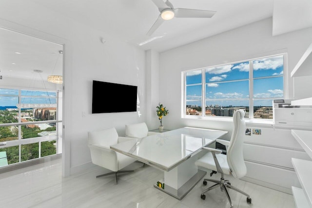 tiled home office featuring a wealth of natural light and ceiling fan