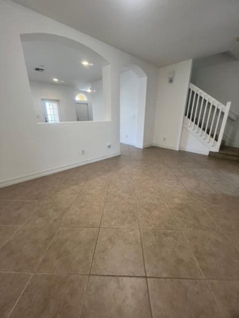 view of tiled spare room