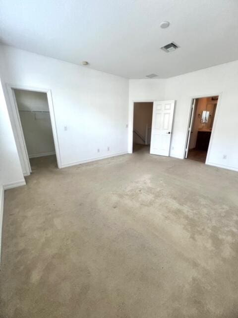 unfurnished bedroom with carpet floors