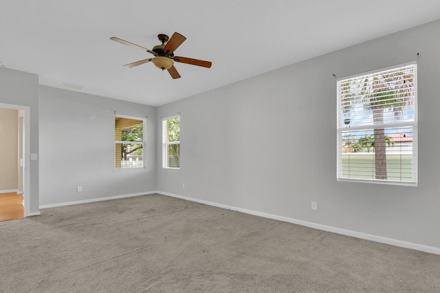 2609 SW Gallery Cir, Palm City, FL 34990 - carpeted spare room featuring ceiling fan and baseboards