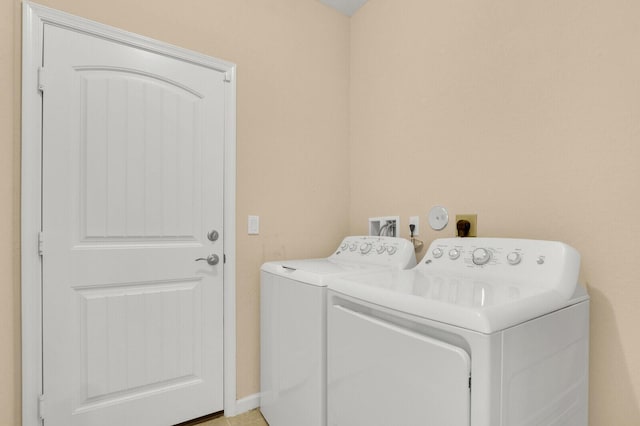 2609 SW Gallery Cir, Palm City, FL 34990 - laundry area with washing machine and dryer