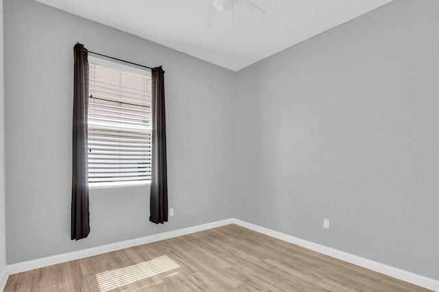 2609 SW Gallery Cir, Palm City, FL 34990 - unfurnished room featuring wood finished floors, ceiling fan, healthy amount of natural light, and baseboards