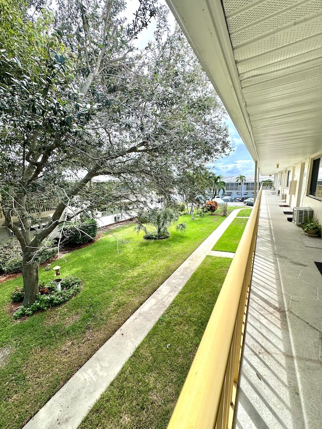 view of yard featuring central air condition unit