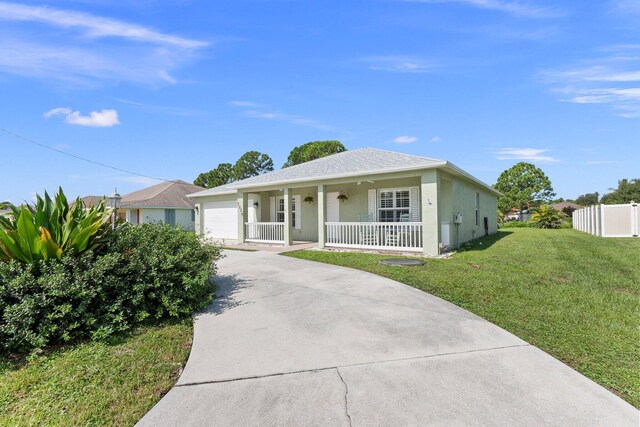 ranch-style home with a porch, a garage, and a front lawn