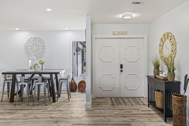 foyer featuring hardwood / wood-style flooring