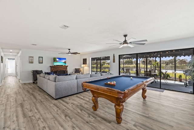 game room featuring billiards, light hardwood / wood-style flooring, and ceiling fan