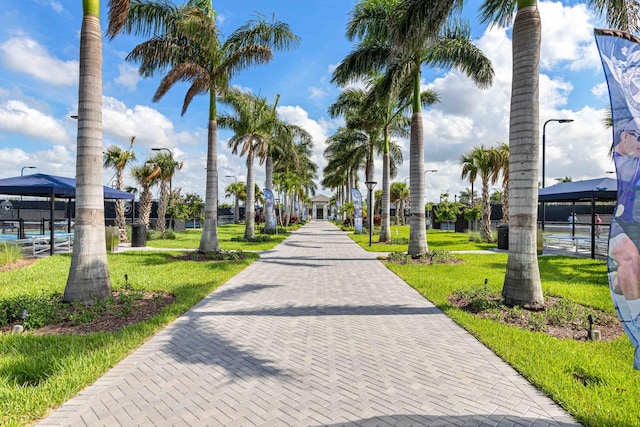 surrounding community with a yard and a gazebo