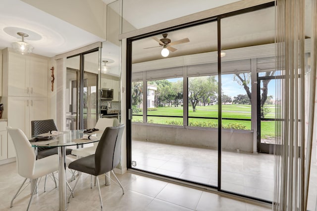 interior space featuring ceiling fan