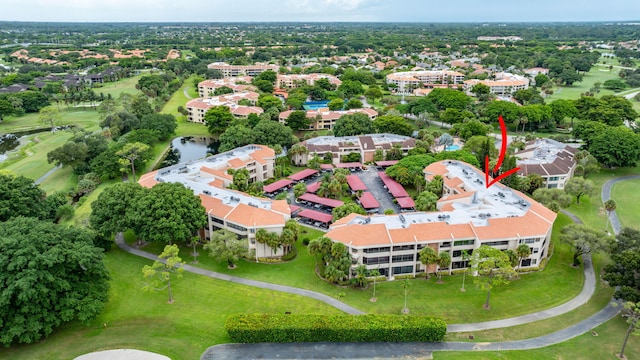 birds eye view of property featuring a residential view, golf course view, and a water view