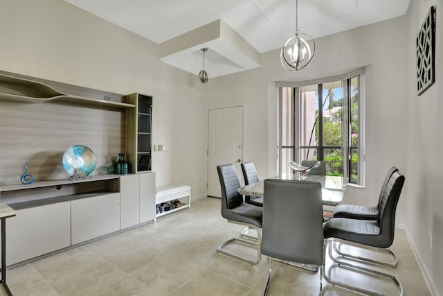 dining area with baseboards and an inviting chandelier