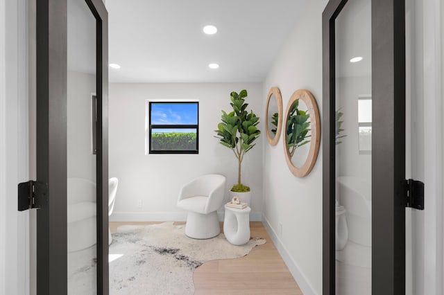 bathroom featuring hardwood / wood-style floors and toilet