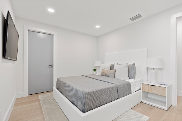 bedroom featuring light wood-type flooring