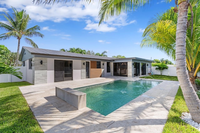 view of pool featuring a patio area