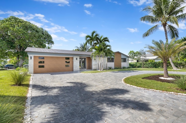 view of front of property with a front lawn