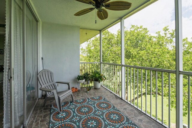 balcony featuring ceiling fan