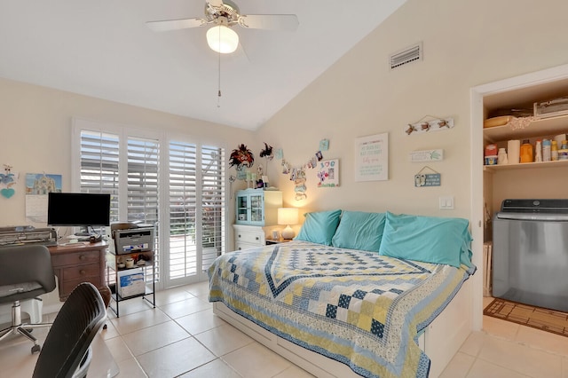 tiled bedroom with lofted ceiling, ceiling fan, washer / dryer, and access to exterior