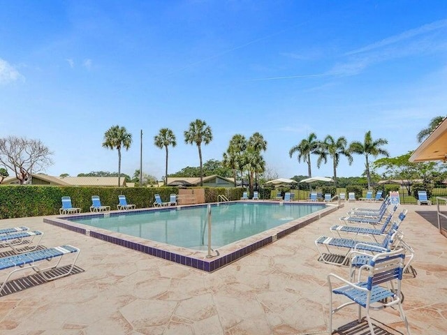 view of swimming pool featuring a patio