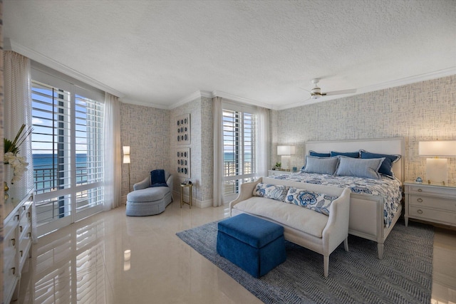 bedroom with crown molding, a water view, a textured ceiling, and ceiling fan