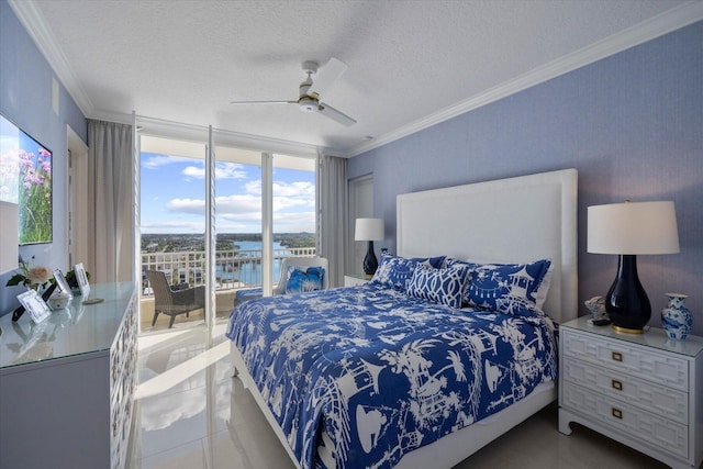 tiled bedroom with a water view, a textured ceiling, access to exterior, and ceiling fan