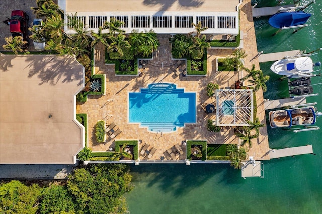 birds eye view of property with a water view