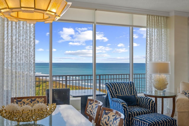 sunroom with a water view