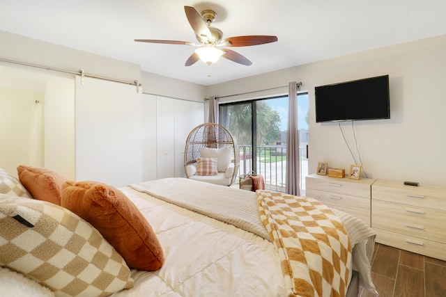 bedroom featuring access to exterior, ceiling fan, a closet, and dark hardwood / wood-style flooring