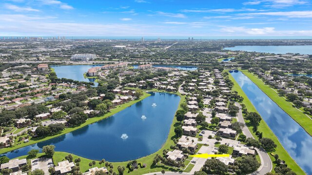 drone / aerial view with a water view