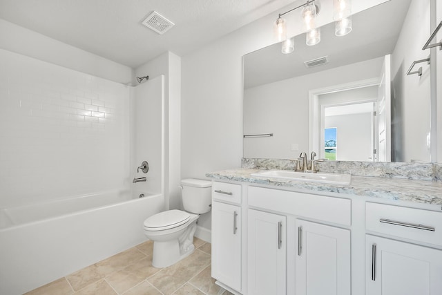 full bathroom featuring vanity, toilet, and tiled shower / bath