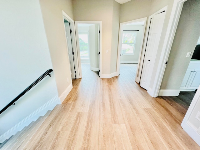 corridor featuring light hardwood / wood-style floors