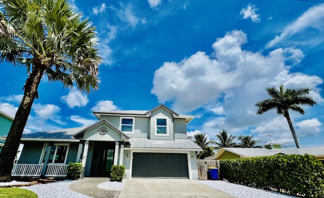 view of front of property with a garage