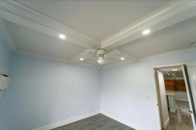 unfurnished room with ornamental molding, beam ceiling, ceiling fan, and dark wood-type flooring