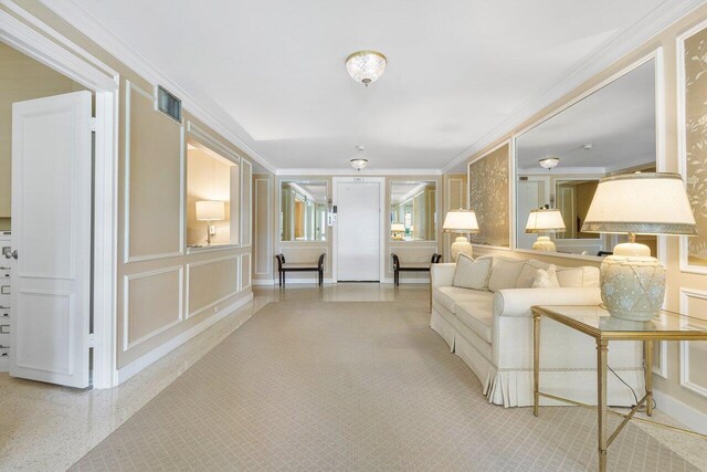 living room with ornamental molding