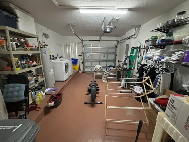 garage featuring water heater, independent washer and dryer, and a garage door opener