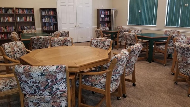 view of carpeted dining space