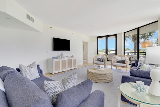 living room featuring expansive windows