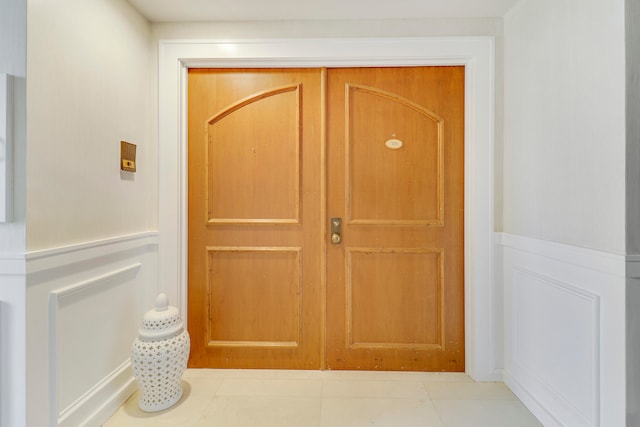 interior space featuring light tile patterned floors