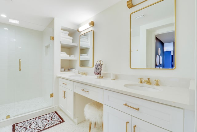 bathroom with vanity and an enclosed shower