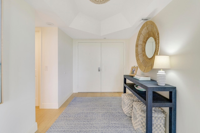 corridor featuring light hardwood / wood-style floors