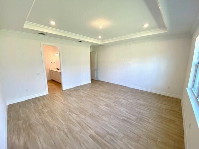 living room featuring light colored carpet and crown molding